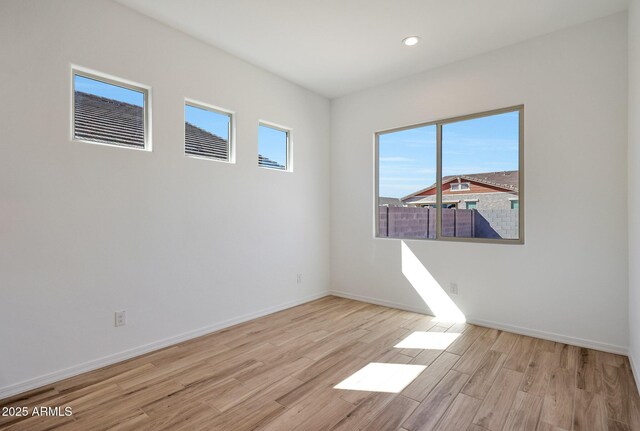 28266 N 134th Dr, Peoria, AZ 85383 - spare room with recessed lighting, wood finished floors, and baseboards