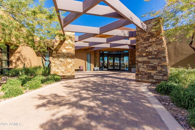10311 E Trent Ave, Mesa, AZ 85212 - exterior space with stone siding, stucco siding, and french doors