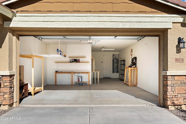 garage featuring electric water heater