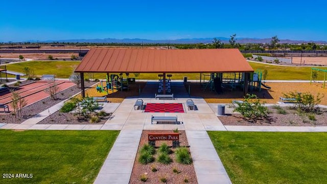 view of home's community featuring a yard