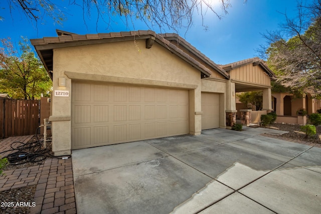 view of front of property with a garage