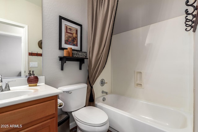 full bathroom with vanity, toilet, and shower / bath combo with shower curtain