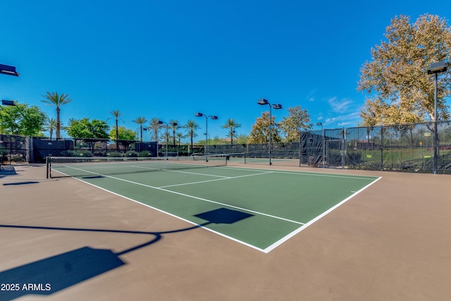 view of tennis court with basketball court