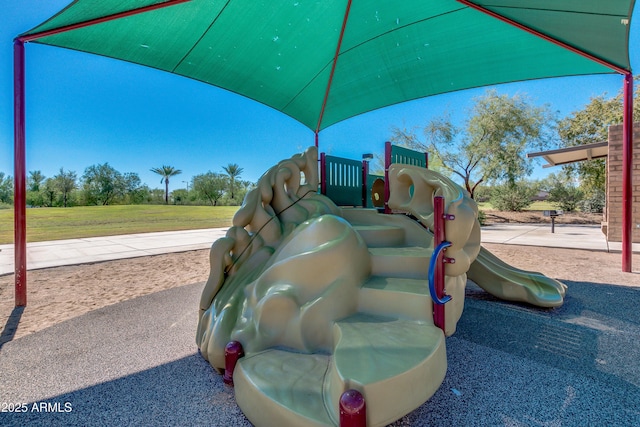 view of playground featuring a yard