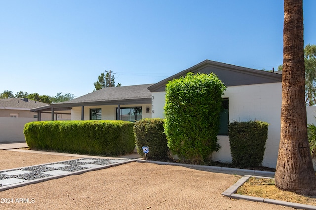 single story home with a garage