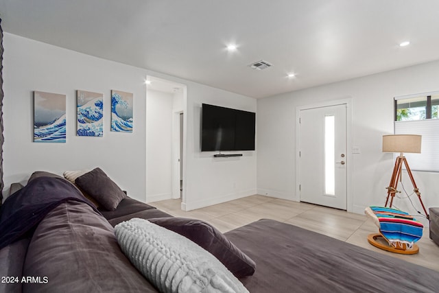 living room with light tile patterned floors