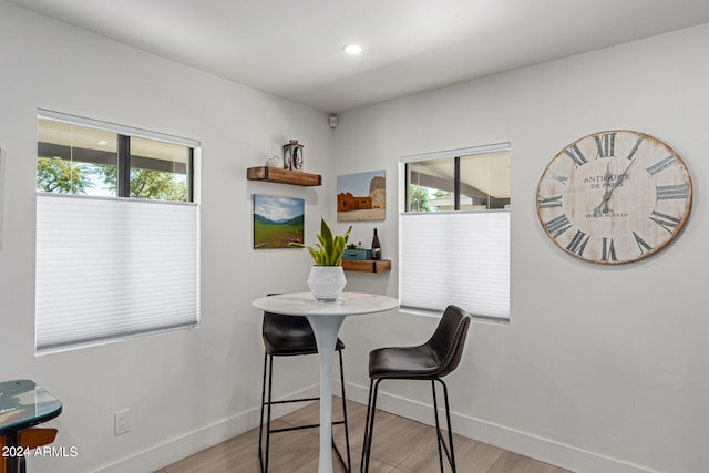 dining area with light hardwood / wood-style floors