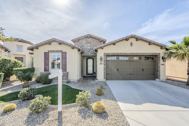 mediterranean / spanish-style house featuring a garage