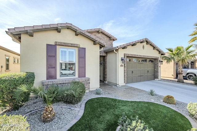 view of front of house with a garage and a front yard