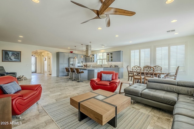 living room featuring ceiling fan