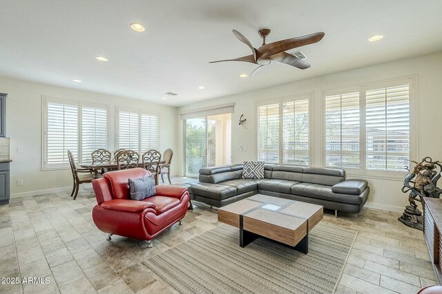 living room featuring ceiling fan