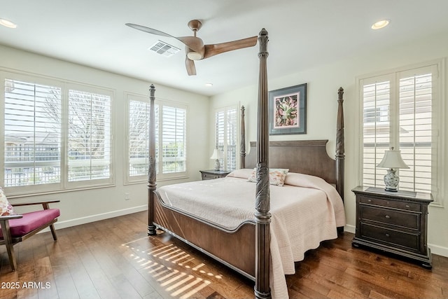 bedroom featuring dark wood-type flooring and ceiling fan