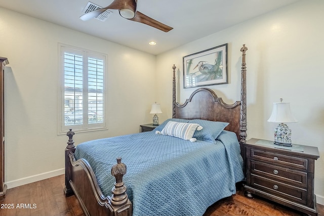 bedroom with dark wood-type flooring and ceiling fan