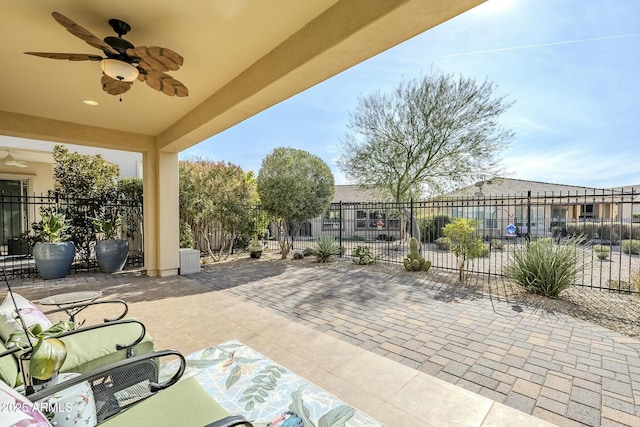 view of patio / terrace featuring ceiling fan