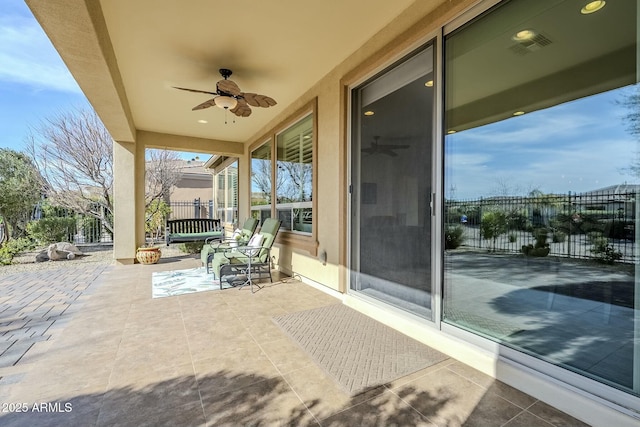 view of patio with ceiling fan