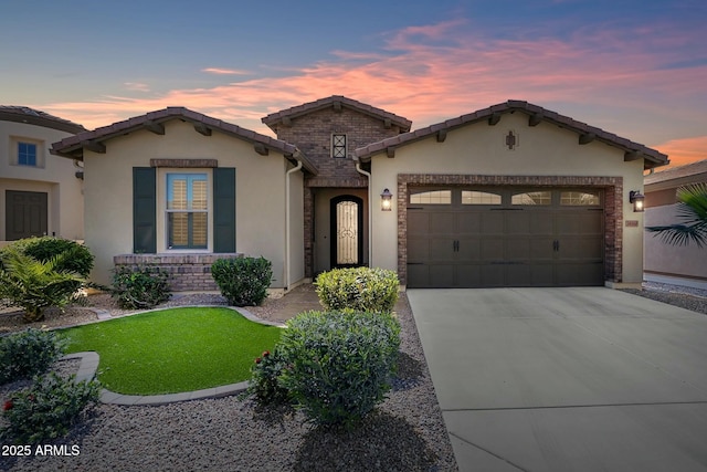 mediterranean / spanish-style house featuring a garage