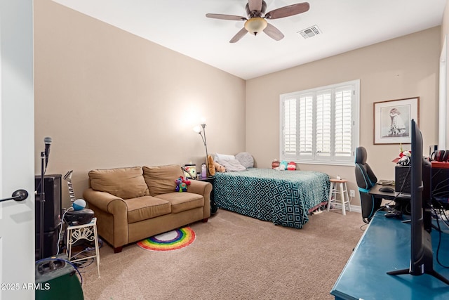 carpeted bedroom featuring ceiling fan