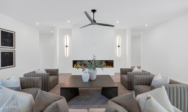 living room featuring ceiling fan