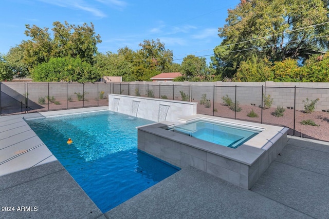 view of pool featuring an in ground hot tub and pool water feature