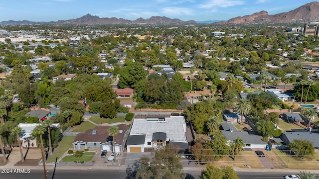 birds eye view of property featuring a mountain view