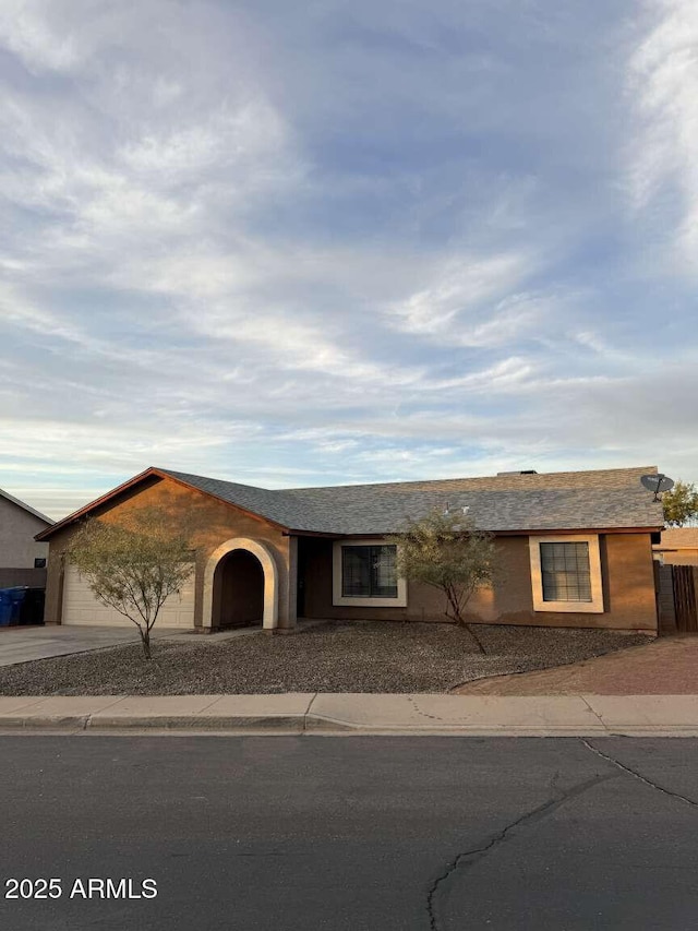 ranch-style house with a garage