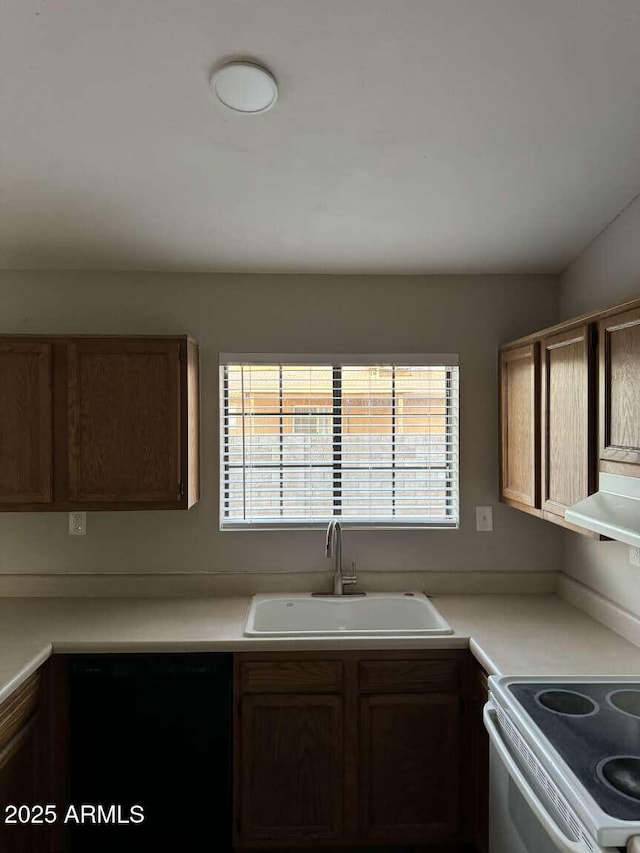 kitchen featuring sink, black dishwasher, and white range with electric cooktop