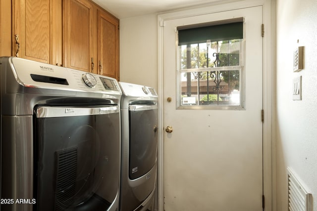 4525 N 66th St Unit 112, Scottsdale, AZ 85251 - laundry area featuring washer and dryer and cabinet space
