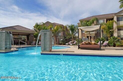 pool with a patio area