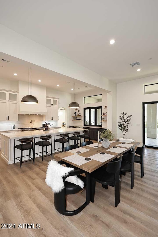 dining room with light hardwood / wood-style floors