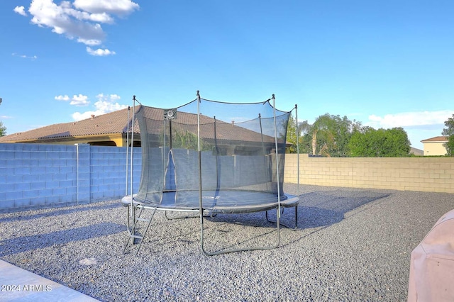 exterior space featuring a trampoline