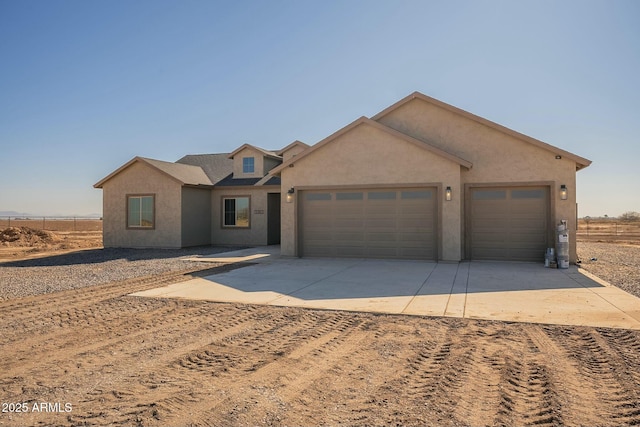 view of front of house with a garage