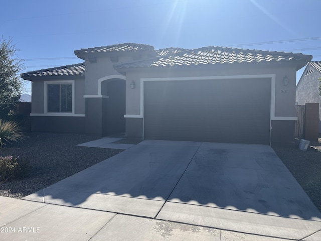 view of front of home with a garage