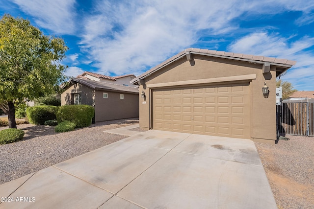 single story home with a garage