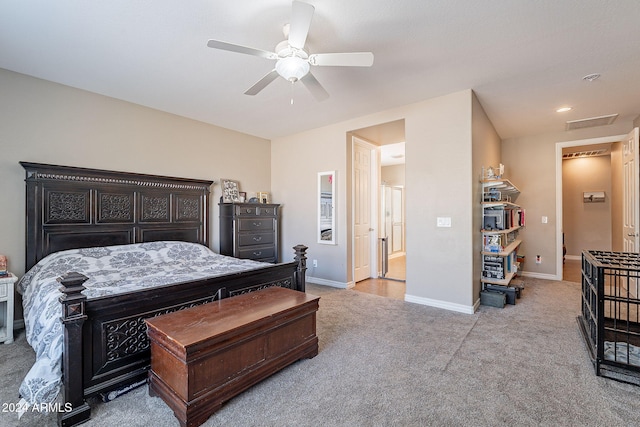 carpeted bedroom with ceiling fan