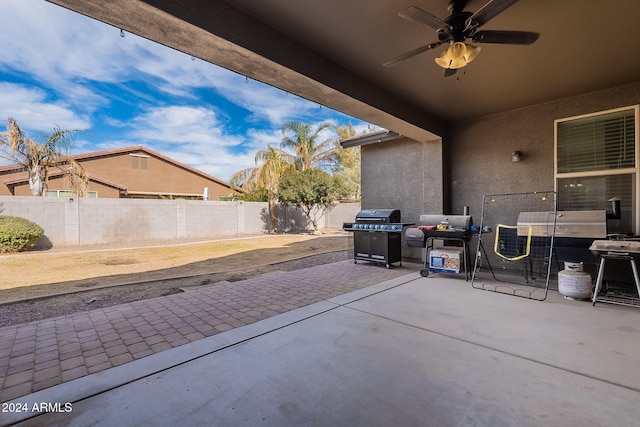 view of patio / terrace featuring ceiling fan and grilling area