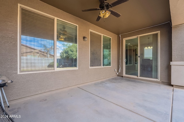 view of patio featuring ceiling fan