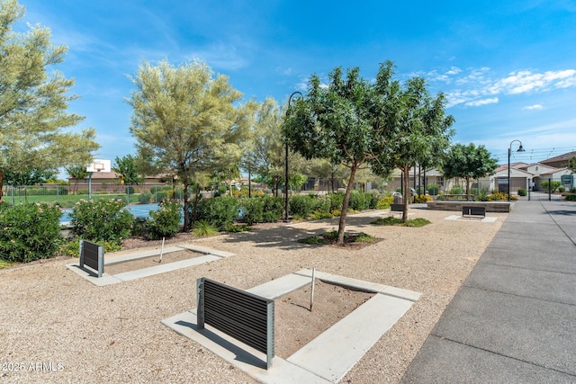 surrounding community featuring fence