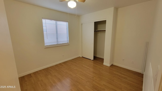 6784 W Gardenia Ave, Glendale, AZ 85303 - unfurnished bedroom with baseboards, a ceiling fan, a closet, and light wood-type flooring