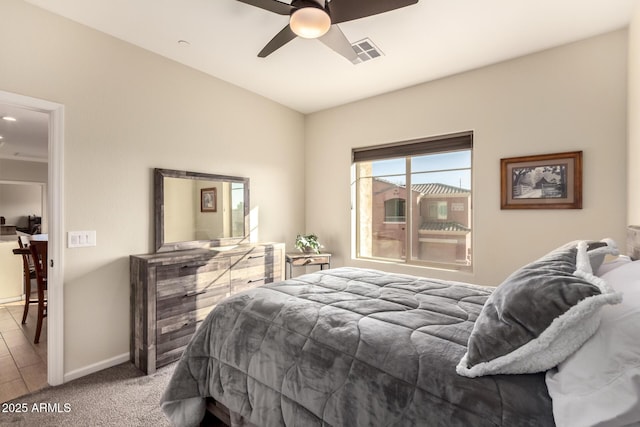 carpeted bedroom featuring ceiling fan