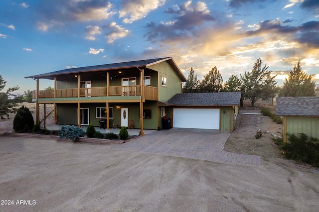 view of front of property with a garage