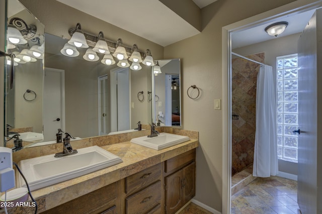 bathroom with vanity and walk in shower