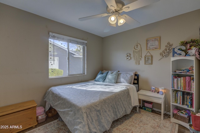 bedroom featuring ceiling fan