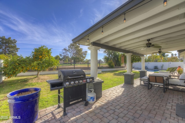 view of patio featuring ceiling fan and grilling area