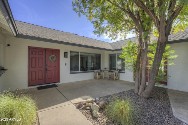 property entrance with a porch