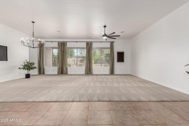 13204 W Palo Verde Dr, Litchfield Park, AZ 85340 - unfurnished room with light colored carpet, baseboards, a chandelier, and ceiling fan