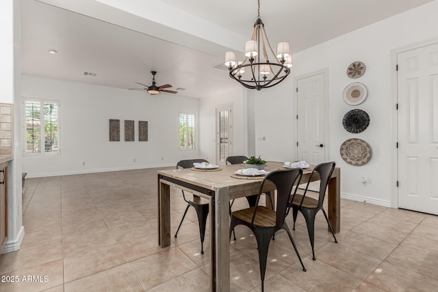 13204 W Palo Verde Dr, Litchfield Park, AZ 85340 - dining space featuring a chandelier, plenty of natural light, a ceiling fan, and light tile patterned floors