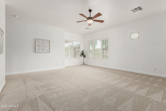 13204 W Palo Verde Dr, Litchfield Park, AZ 85340 - empty room featuring ceiling fan, light carpet, and baseboards