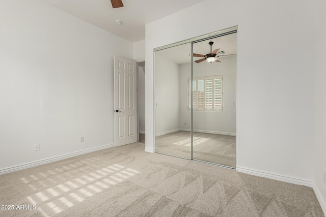 13204 W Palo Verde Dr, Litchfield Park, AZ 85340 - unfurnished bedroom featuring carpet floors, ceiling fan, a closet, and baseboards
