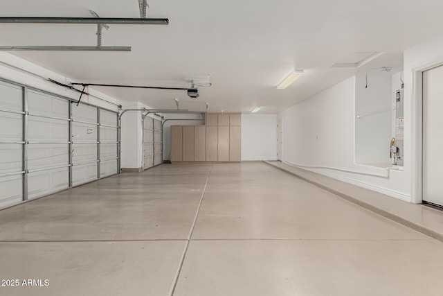 13204 W Palo Verde Dr, Litchfield Park, AZ 85340 - garage with a garage door opener and water heater