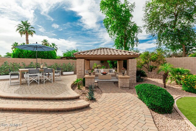 13204 W Palo Verde Dr, Litchfield Park, AZ 85340 - fenced backyard with a gazebo, a patio area, outdoor lounge area, and outdoor dining space